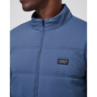 Travis Mathew Palisades Puffer Golfjacke - Marine