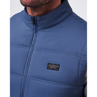 Travis Mathew Palisades Puffer Golfweste - Marine