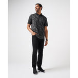 Travis Mathew studieren im Ausland Golf Polo Shirt - Schwarz